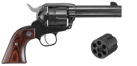 Ruger Vaquero Convertible Blued / Wood .357 Mag / .38 SPL / 9mm 4.62-inch 6Rds Includes 9mm Cylinder Ruger Vaquero Convertible Blued / Wood .357 Mag / .38 SPL / 9mm 4.62-inch 6Rds Includes 9mm Cylinder
